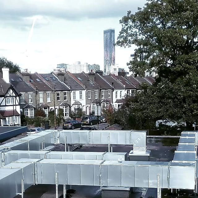 Rooftop ductwork serving a school canteen in Croydon that was overheating every summer.